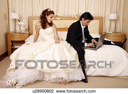 Bride waiting for groom to get off his laptop View Large Photo Image Stock Image - Bride waiting for groom to get off his laptop. Fotosearch