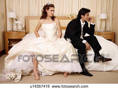 Bride waiting for groom to get off the phone View Large Photo Image Stock Photo - Bride waiting for groom to get off the phone. Fotosearch