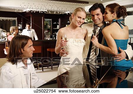 Group of people celebrating View Large Photo Image Picture - Group of people celebrating . Fotosearch