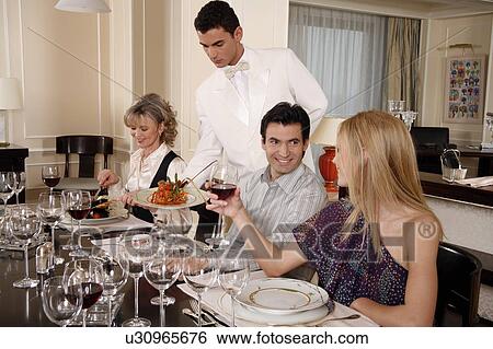 Stock Photograph - People dining . Fotosearch