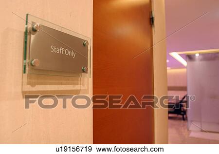 Stock Photo - Staff only sign in hallway. Fotosearch