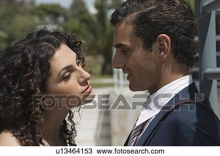 Business couple in a park View Large Photo Image Stock Image - Business couple in a park. Fotosearch