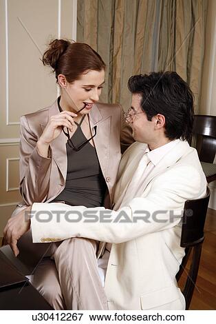Business people having a meeting View Large Photo Image Stock Photo - Business people having a meeting . Fotosearch