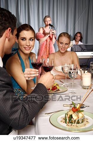Group of people celebrating View Large Photo Image Stock Photo - Group of people celebrating . Fotosearch