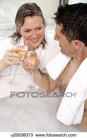 Mature couple having fun in the bathtub View Large Photo Image Stock Image - Mature couple having fun in the bathtub. Fotosearch
