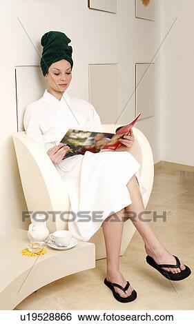 Stock Photograph - Young woman waiting in a beauty salon. Fotosearch
