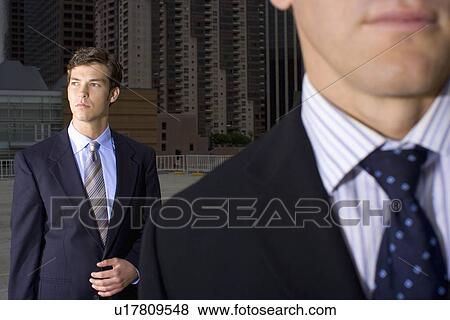 A Pair of Businessman in Downtown, Differential Focus, Close Up, Waist Up, Differential Focus, Front View View Large Photo Image Stock Photo - A Pair of Businessman in Downtown, Differential Focus, Close Up, Waist Up, Differential Focus, Front View. Fotosearch