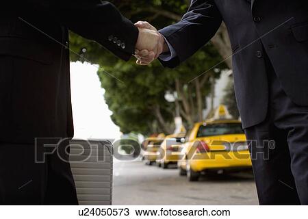 A Pair of Businessman Shaking Hands, Differential Focus View Large Photo Image Stock Image - A Pair of Businessman Shaking Hands, Differential Focus. Fotosearch
