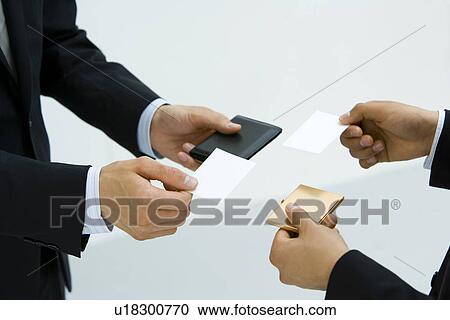Exchanging Business Cards, Body Parts, High Angle View, Close Up View Large Photo Image Stock Image - Exchanging Business Cards, Body Parts, High Angle View, Close Up. Fotosearch