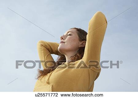Detail of a young Woman stretching. View Large Photo Image Stock Image - Detail of a young Woman stretching.. Fotosearch