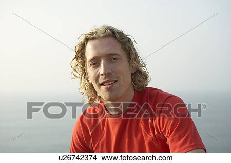 Picture - Portrait of a young Male runner.. Fotosearch