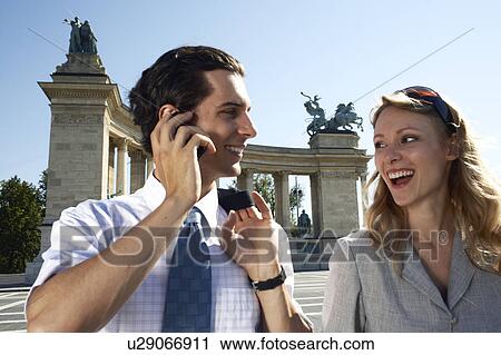 Businessman and businesswoman outdoors. View Large Photo Image Stock Image - Businessman and businesswoman outdoors.. Fotosearch
