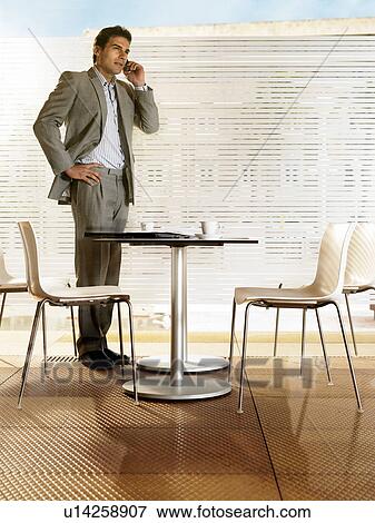 Businessman in a restaurant. View Large Photo Image Stock Photo - Businessman in a restaurant.. Fotosearch