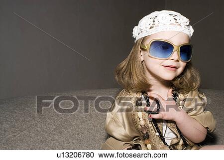 Girl (2-4) dressed for a party. View Large Photo Image Stock Image - Girl (2-4) dressed for a party.. Fotosearch
