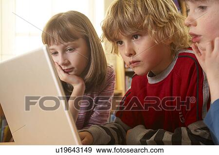 Children on computer View Large Photo Image Stock Photo - Children on computer. Fotosearch