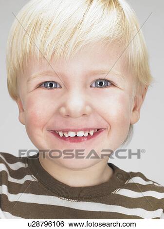 Stock Photograph - Little boy smiling.. Fotosearch