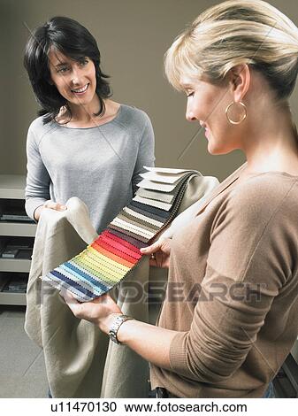 Designer showing fabric samples to client. View Large Photo Image Stock Image - Designer showing fabric samples to client.. Fotosearch