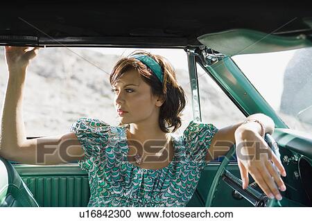 Woman in car. View Large Photo Image Stock Image - Woman in car.. Fotosearch