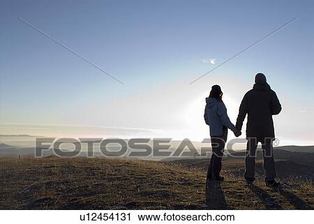 Couple holding hands. View Large Photo Image Stock Image - Couple holding hands.. Fotosearch