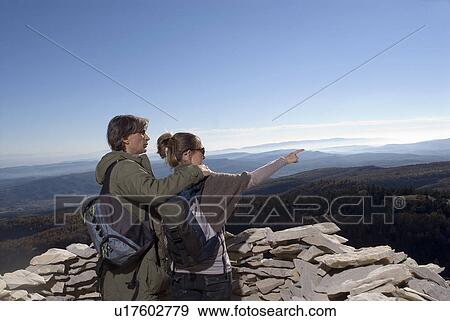 Couple trekking. View Large Photo Image Stock Photo - Couple trekking.. Fotosearch