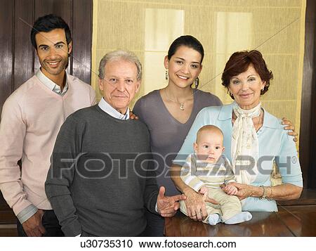 Multigenerational family (grandparents, parents and baby boy(7months), portrait. Alicante, Spain. View Large Photo Image Stock Image - Multigenerational family (grandparents, parents and baby boy(7months), portrait. Alicante, Spain.. Fotosearch