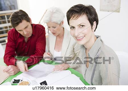 Business people in discussion View Large Photo Image Stock Photograph - Business people in discussion. Fotosearch