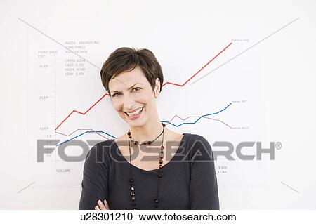 Woman in front of a chart View Large Photo Image Stock Image - Woman in front of a chart. Fotosearch