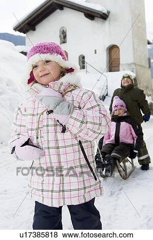 Children playing with sledge in snow View Large Photo Image Stock Photo - Children playing with sledge in snow. Fotosearch