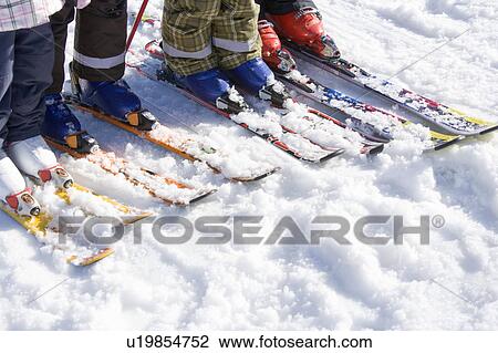 Stock Image - Four pairs of skis. Fotosearch