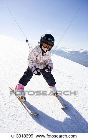 Girl skiing View Large Photo Image Stock Photo - Girl skiing. Fotosearch