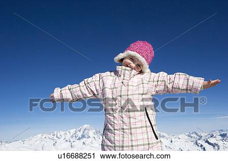 Girl smiling with arms spread View Large Photo Image Stock Image - Girl smiling with arms spread. Fotosearch