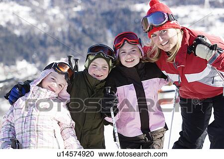 Mother with three children smiling View Large Photo Image Stock Image - Mother with three children smiling. Fotosearch