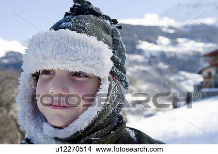 Portrait of boy with hat in mountains View Large Photo Image Picture - Portrait of boy with hat in mountains. Fotosearch