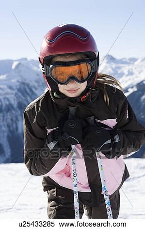 Portrait of young girl in ski kit View Large Photo Image Stock Photography - Portrait of young girl in ski kit . Fotosearch