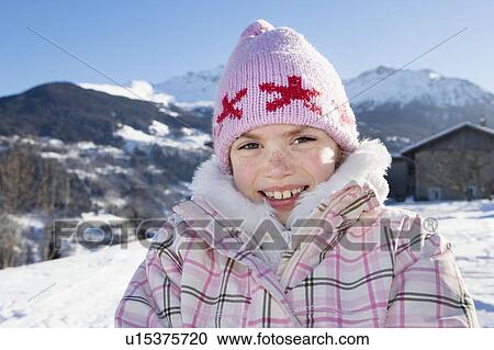 Portrait of young girl in the snow View Large Photo Image Stock Image - Portrait of young girl in the snow. Fotosearch