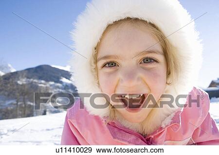 Portrait of young girl in the snow View Large Photo Image Stock Photo - Portrait of young girl in the snow . Fotosearch