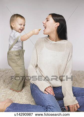 Daughter and mother playing. View Large Photo Image Stock Photo - Daughter and mother playing.. Fotosearch