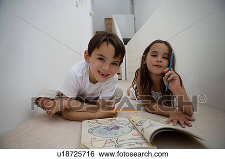 Portrait of a girl and boy coloring. View Large Photo Image Stock Photograph - Portrait of a girl and boy coloring.. Fotosearch