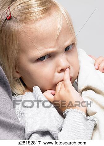 Little girl making a face View Large Photo Image Stock Photo - Little girl making a face. Fotosearch