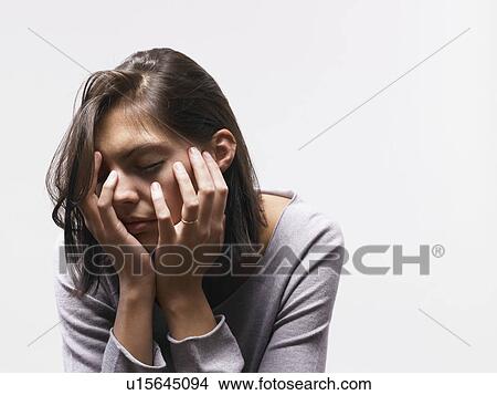 Picture - Woman looking depressed. Fotosearch