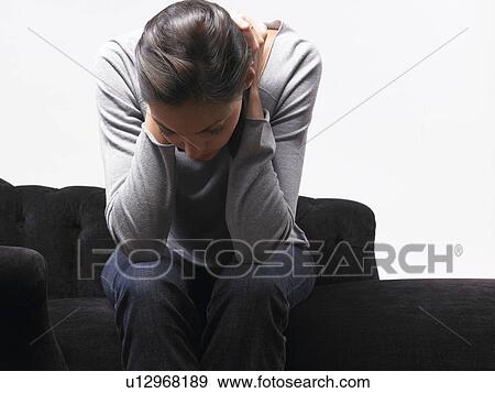Stock Photo - Woman looking depressed. Fotosearch