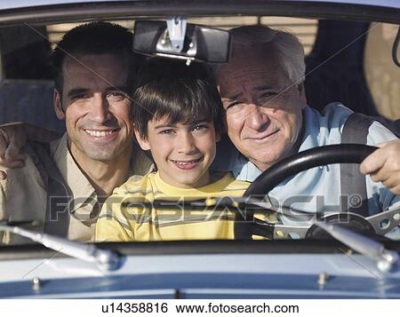 Boy (8-10) sitting in car with father and grandfather, smiling, portrait View Large Photo Image Stock Photograph - Boy (8-10) sitting in car with father and grandfather, smiling, portrait. Fotosearch