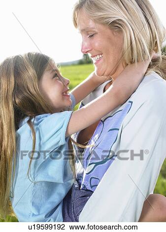 Stock Image - Mother and daughter portrait.. Fotosearch