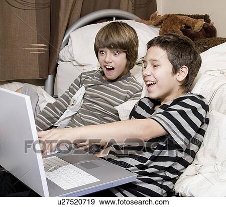 Boys on computer View Large Photo Image Stock Photo - Boys on computer. Fotosearch