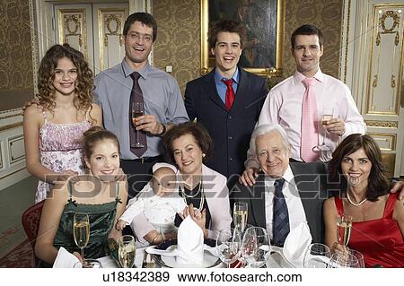 Stock Photo - Multigenerational family smiling, portrait. Fotosearch