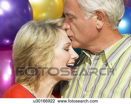 Senior couple embracing View Large Photo Image Stock Image - Senior couple embracing. Fotosearch