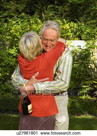 Senior couple hugging View Large Photo Image Stock Image - Senior couple hugging. Fotosearch