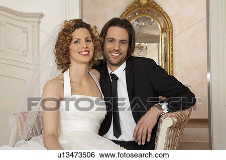 young bridal couple smiling, portrait View Large Photo Image Stock Photograph - young bridal couple smiling, portrait. Fotosearch