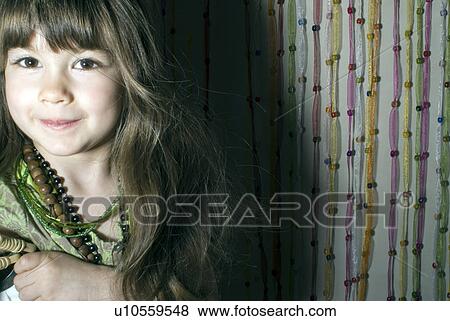 Girl (2-4) dressed in party clothes. View Large Photo Image Stock Photo - Girl (2-4) dressed in party clothes.. Fotosearch