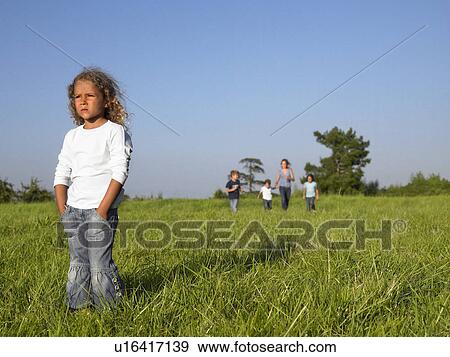 Stock Photo - Group of kids running in a field.. Fotosearch